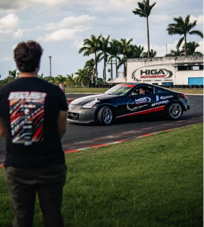 Diego Drift School track with drift car and Higa Motorsports signage